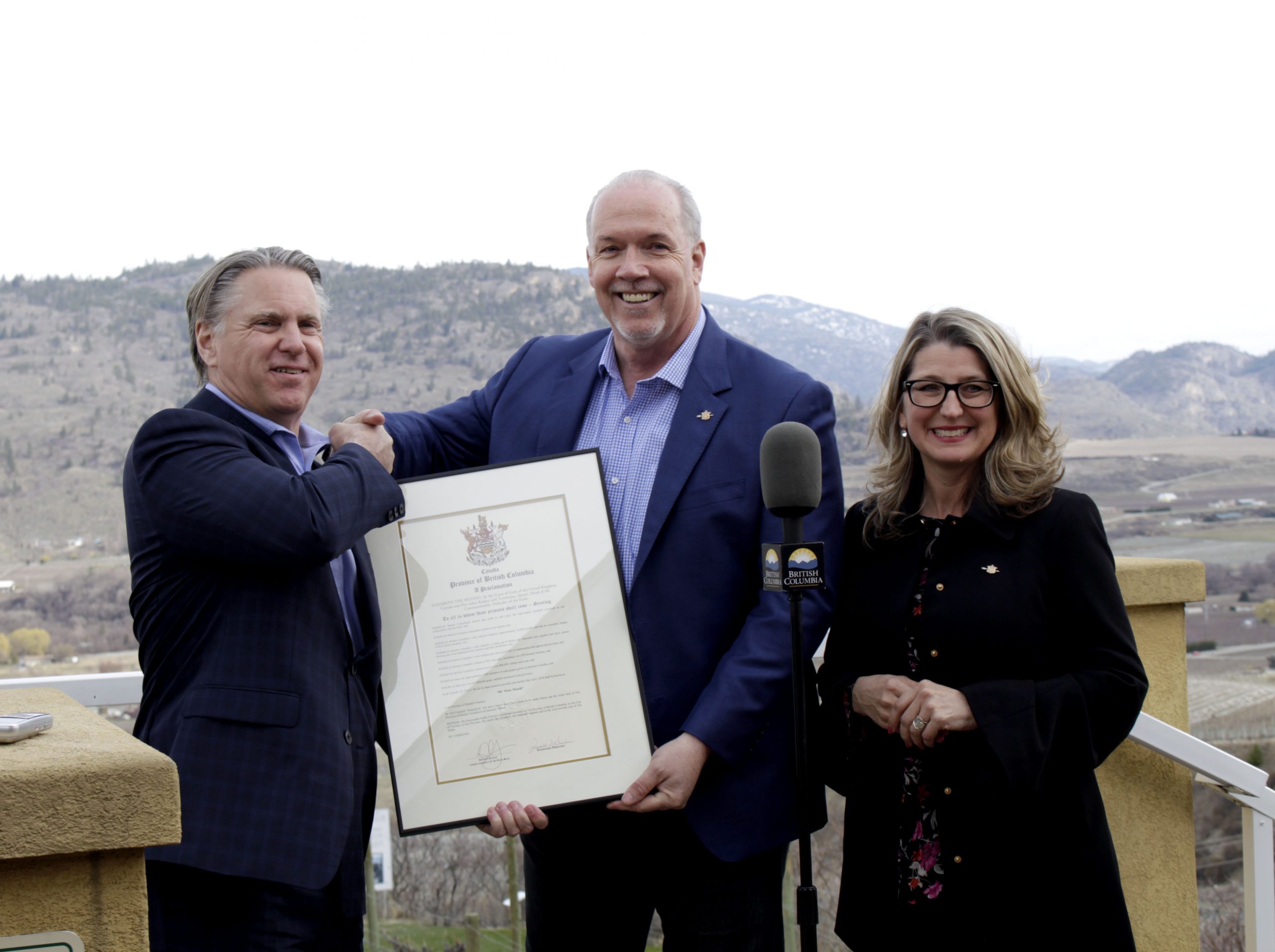 Brenda Dorosz presented NDP Leader John Horgan with a petition from local residents calling on the government to give guarantees that rural education funding will be permanent. Horgan received the petition on Tuesday when he stopped by at Troy’s Grill to meet supporters and he will present the petition in the B.C. Legislature. (Richard McGuire photo)