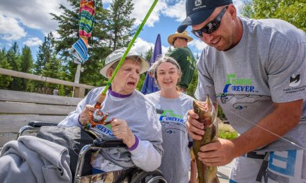 At Fishing Forever event, families fish together, disabled or not