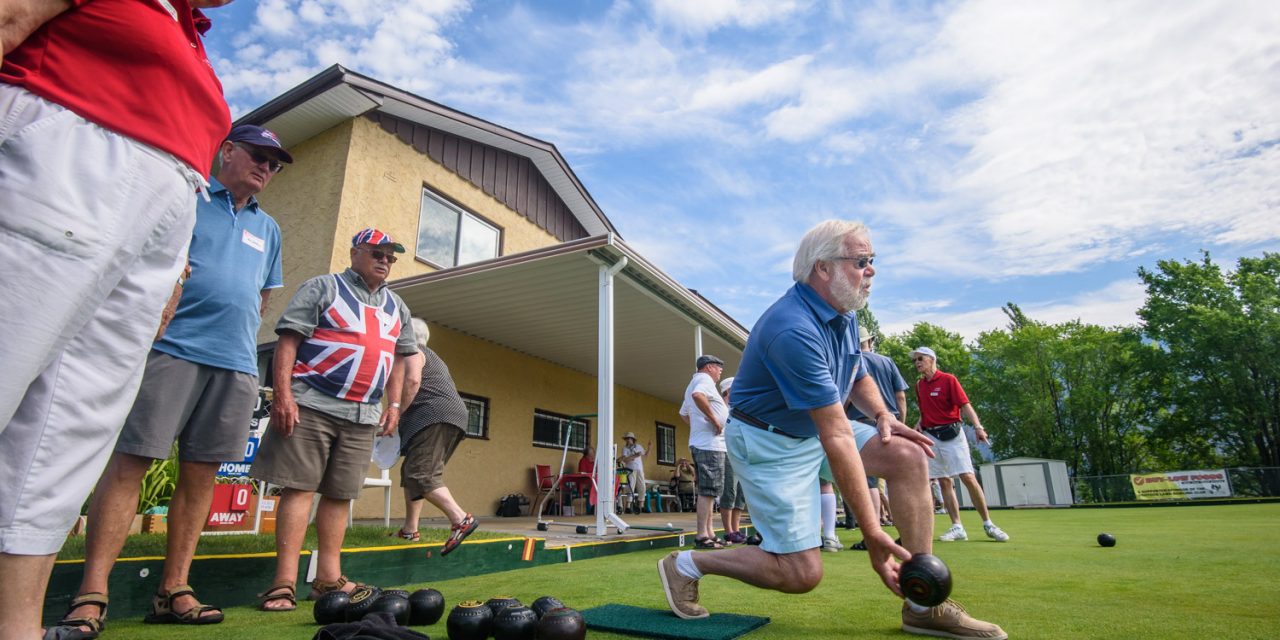 Fans of antique MG sports cars try lawn bowling while on annual Osoyoos pilgrimage