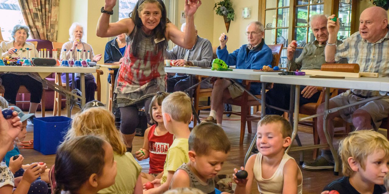 Young and old share power of music in rhythm band at Mariposa Gardens