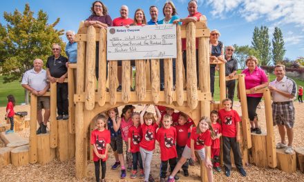 Osoyoos Rotarians present cheque for Osoyoos Elementary natural playground project