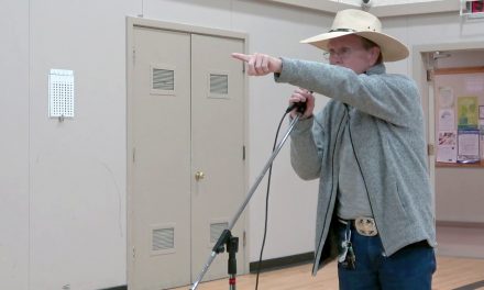 Resident who sleeps with baseball bat asks candidates about policing at forum
