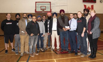 Local Sikhs help OSS get new scoreboard