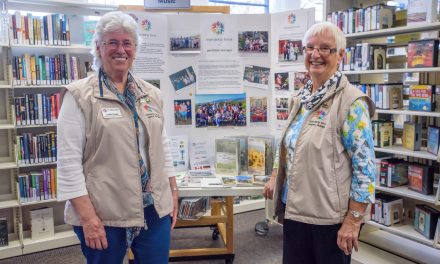 Library visitors learn about travel to make local friends