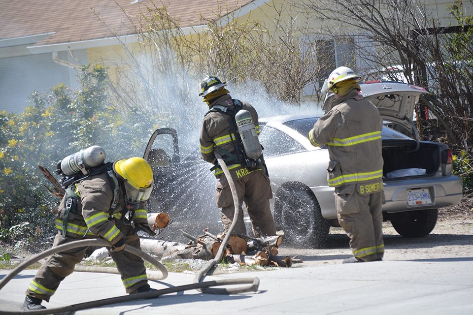 Firefighters snuff out car fire