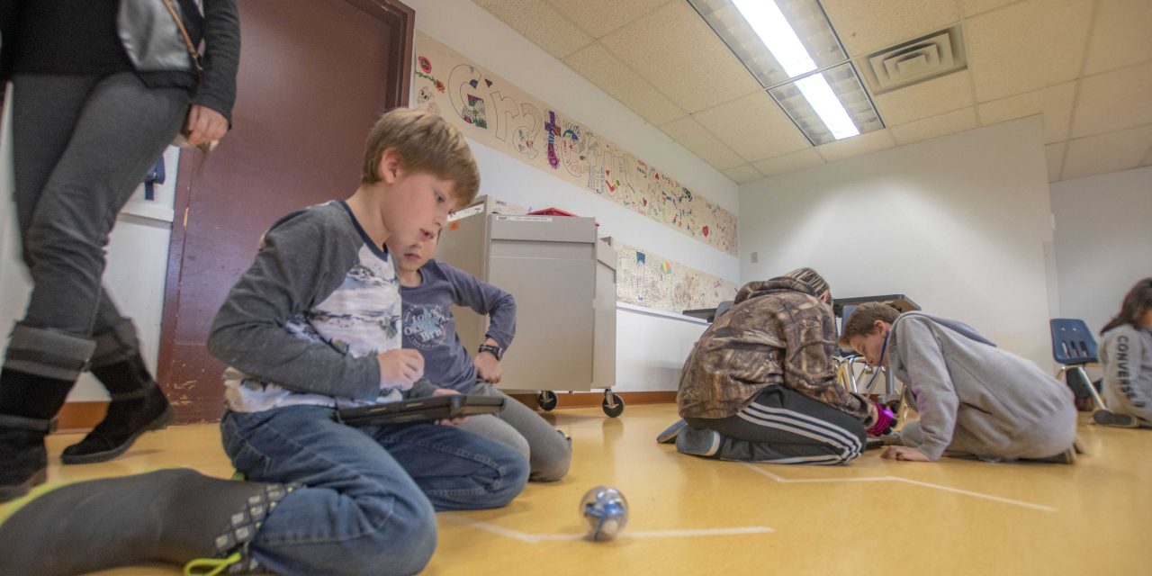 Students applying coding to robotics at OES