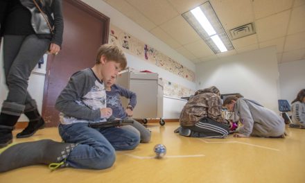 Students applying coding to robotics at OES