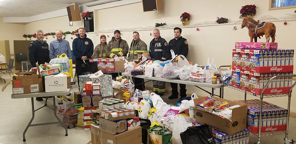 Fire Rescue collecting donations for food bank, providing new smoke alarms to residents