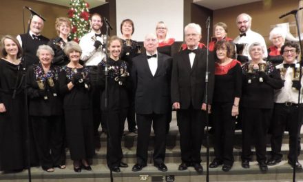 Handbell Ringers spreading Christmas joy in Oliver