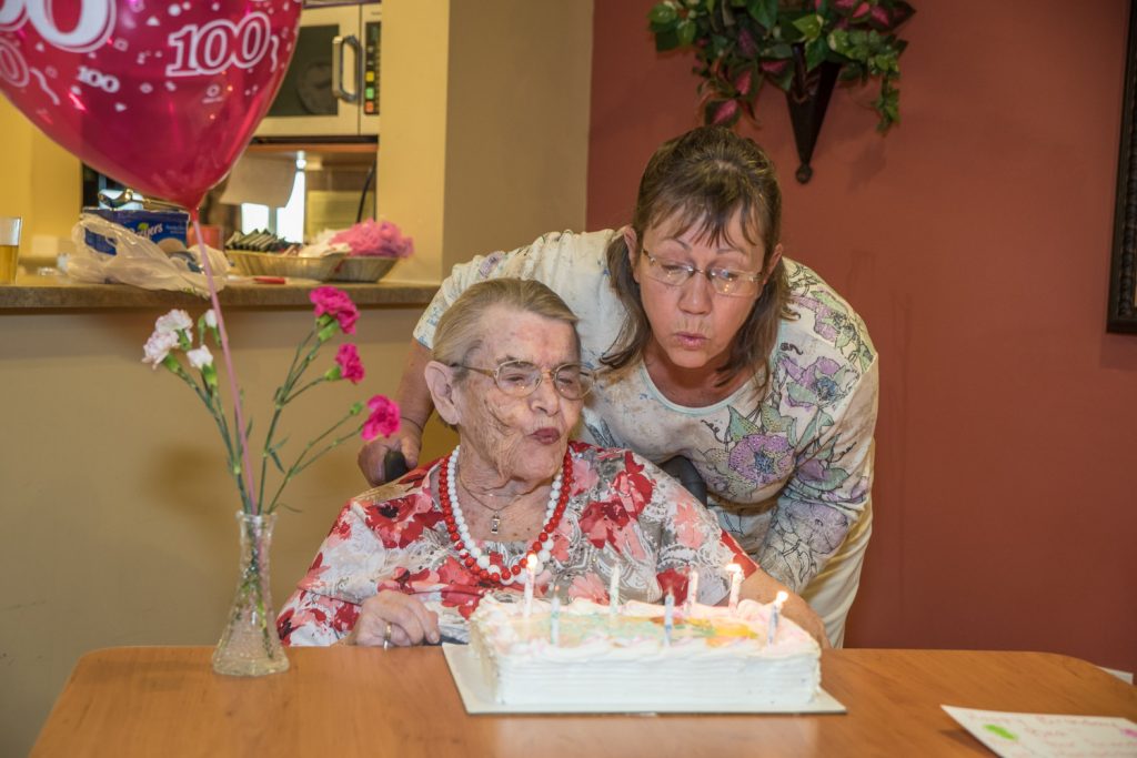 Bea (Bernice) Graham celebrated her 100th birthday on Monday at Mariposa Gardens. Helping her to blow our her candles was her daughter Carol Graham. Unable to make it to the celebration were daughter Joyce Hopkins of Osoyoos and son Bruce Graham of Pender Island. Bea Graham is originally from Beaverlodge, Alta. and she came to Osoyoos on her 97th birthday three years ago. (Richard McGuire photo)