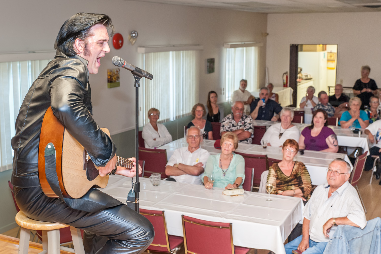 Elvis Presley (a.k.a. Adam Fitzpatrick of Penticton) gave a lively performance Saturday night at the Osoyoos Seniors Centre. Fitzpatrick's show, the Elvis Evolution, portrays the King's different phases of his career. Fitzpatrick, who has competed in international Elvis competitions, performed in January at Mariposa Gardens. Some of the ladies in the audience were overheard saying how smitten they were with Elvis. Photo by Richard McGuire, Osoyoos Times.