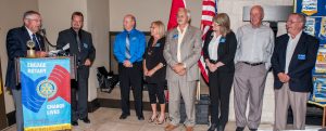 Rotary district governor Garry Hollingshead left) swears in the new Rotary Club of Osoyoos board.