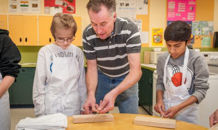 OES students put on hairnets and aprons for introduction to food trades