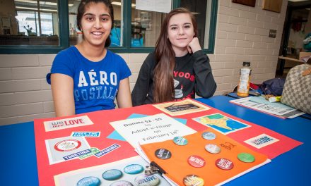 OSS students selling ‘love’ buttons to help combat global poverty