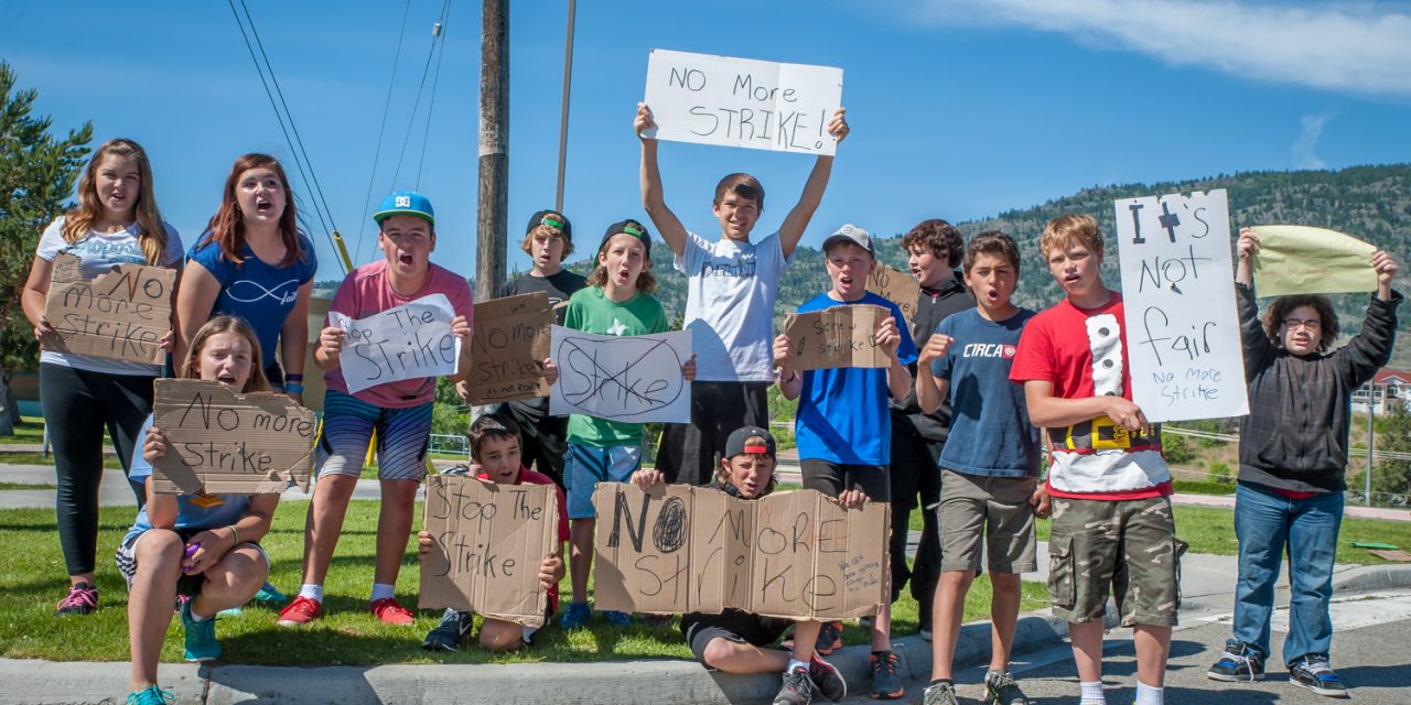 Students walk out of school to protest labour dispute
