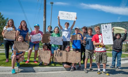 Students walk out of school to protest labour dispute