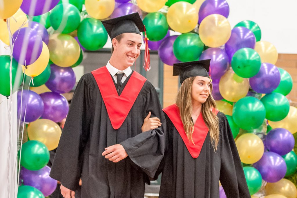 Graduates march past proud parents, friends and relatives to be honoured for their achievements. (Richard McGuire photo)
