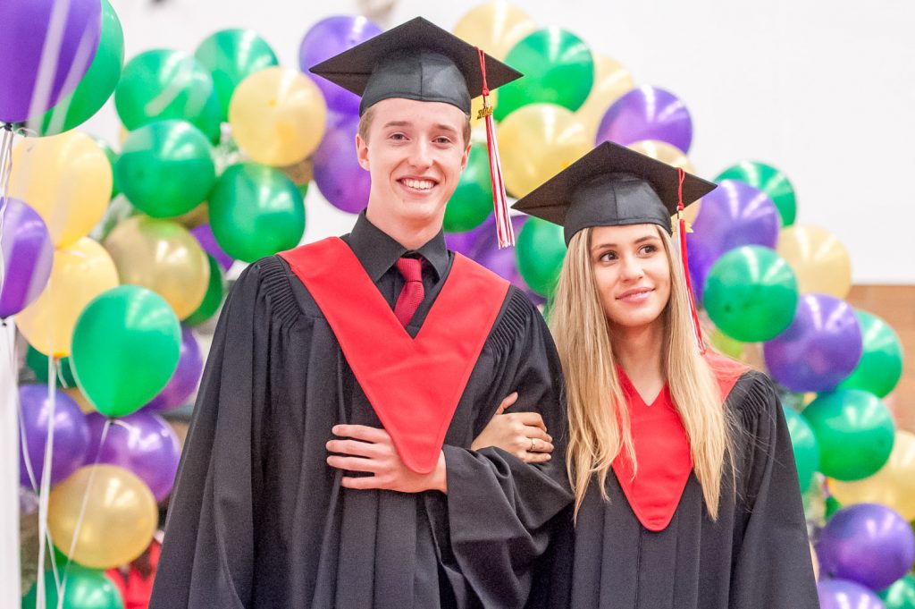 Graduates march past proud parents, friends and relatives to be honoured for their achievements. (Richard McGuire photo)