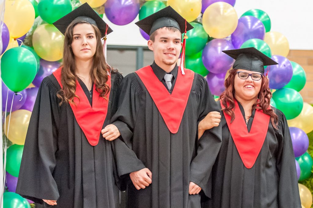 Graduates march past proud parents, friends and relatives to be honoured for their achievements. (Richard McGuire photo)