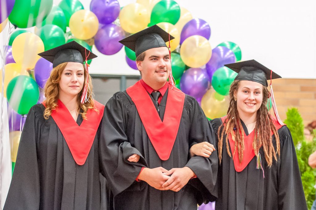 Graduates march past proud parents, friends and relatives to be honoured for their achievements. (Richard McGuire photo)