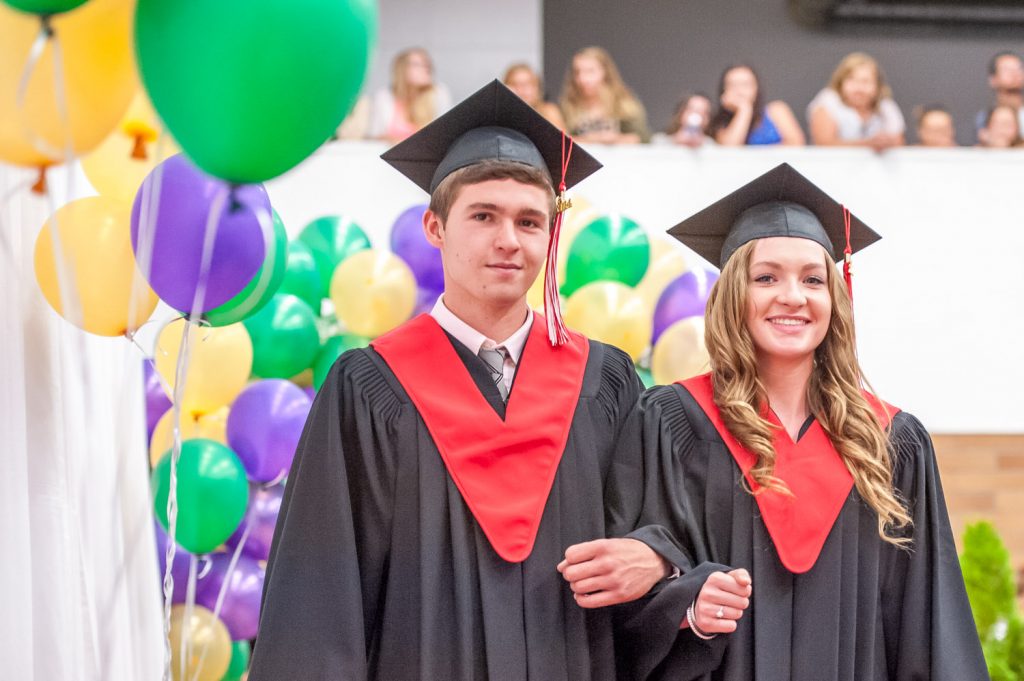 Graduates march past proud parents, friends and relatives to be honoured for their achievements. (Richard McGuire photo)
