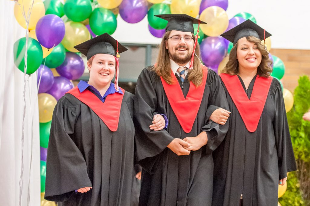 Graduates march past proud parents, friends and relatives to be honoured for their achievements. (Richard McGuire photo)