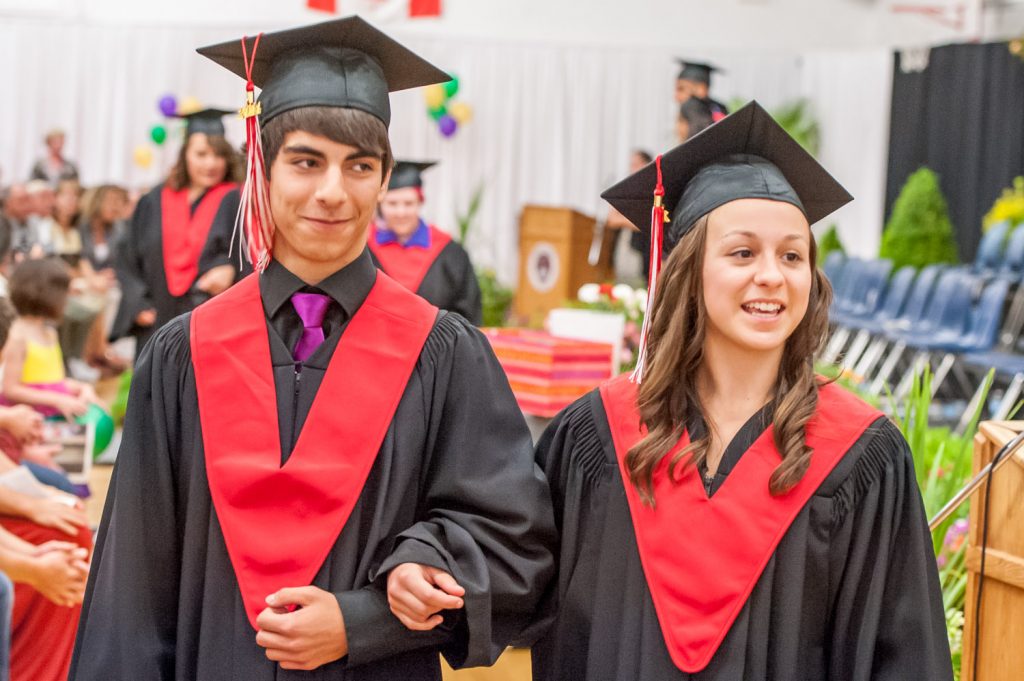 Graduates march past proud parents, friends and relatives to be honoured for their achievements. (Richard McGuire photo)