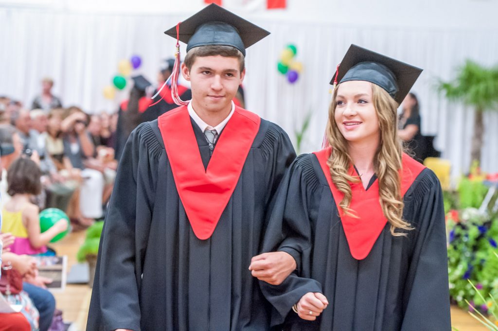Graduates march past proud parents, friends and relatives to be honoured for their achievements. (Richard McGuire photo)