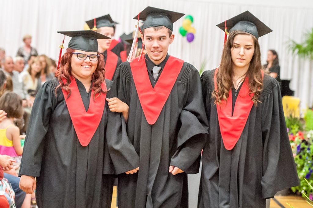 Graduates march past proud parents, friends and relatives to be honoured for their achievements. (Richard McGuire photo)