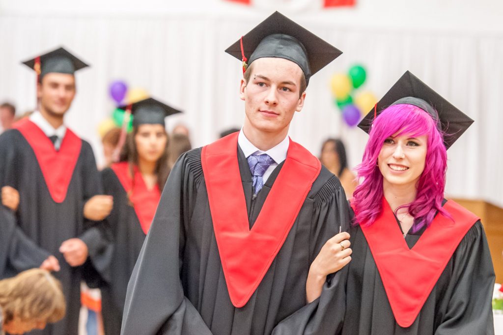 Graduates march past proud parents, friends and relatives to be honoured for their achievements. (Richard McGuire photo)