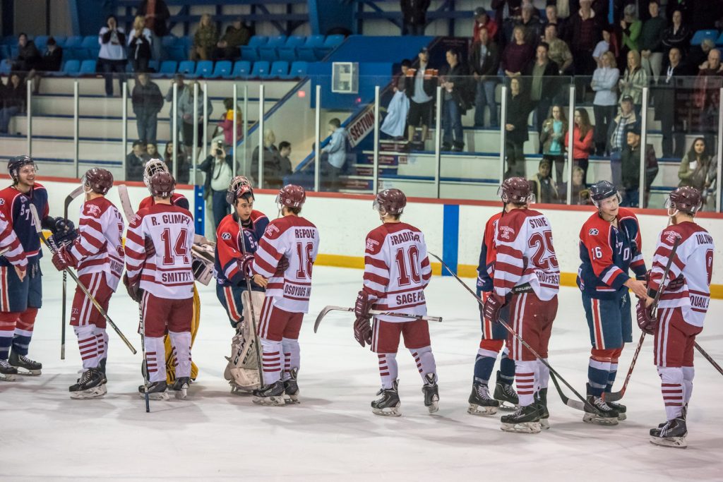 The Kamloops Storm and Osoyoos Coyotes meet at centre ice to offer each other congratulations on a well-played series. (Richard McGuire photo)