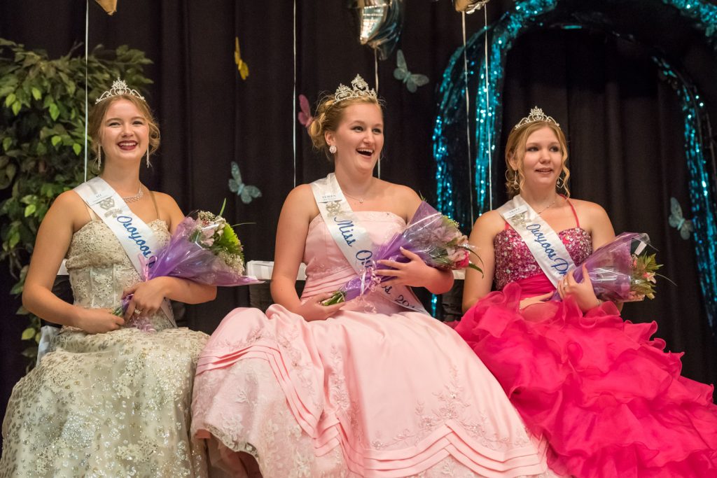 Wearing their gowns, the outgoing Royalty wait to pass on their crowns. From left are Princess Ali Hutter, Miss Osoyoos Teagen Aspell and Princes Amara Leeson. (Richard McGuire photo)