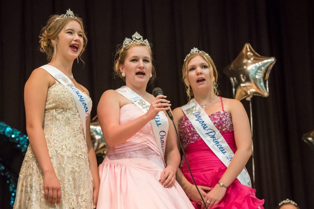 The outgoing Royalty sing the Osoyoos song for the last time as Royalty. From left are Princess Ali Hutter, Miss Osoyoos Teagen Aspell and Princes Amara Leeson. (Richard McGuire photo)