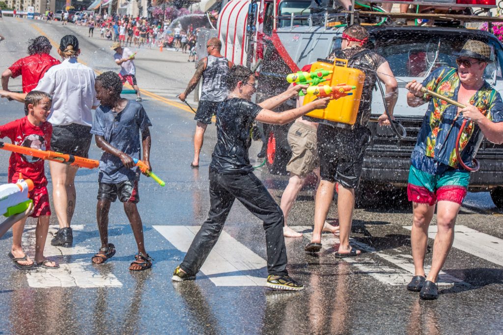 Hordes of children armed with all sizes of water gun were loaded and ready to take on the Osoyoos firefighters. The water fight is a popular highlight of Cherry Fiesta and gets under way just before the parade. (Richard McGuire photo)