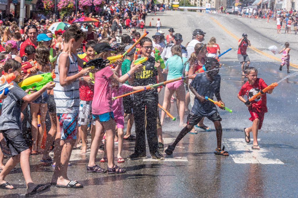 Hordes of children armed with all sizes of water gun were loaded and ready to take on the Osoyoos firefighters. The water fight is a popular highlight of Cherry Fiesta and gets under way just before the parade. (Richard McGuire photo)