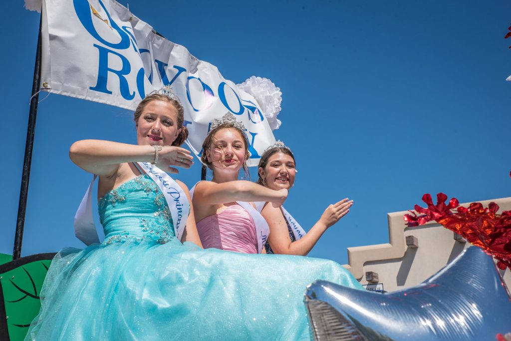 Only a day into their new roles as Osoyoos Royalty, these young ladies have already perfected the "royal wave." From left are Princess Bailey Toepfer, Miss Osoyoos Emma Fernandes and Princess Tianna Morgan. (Richard McGuire photo)