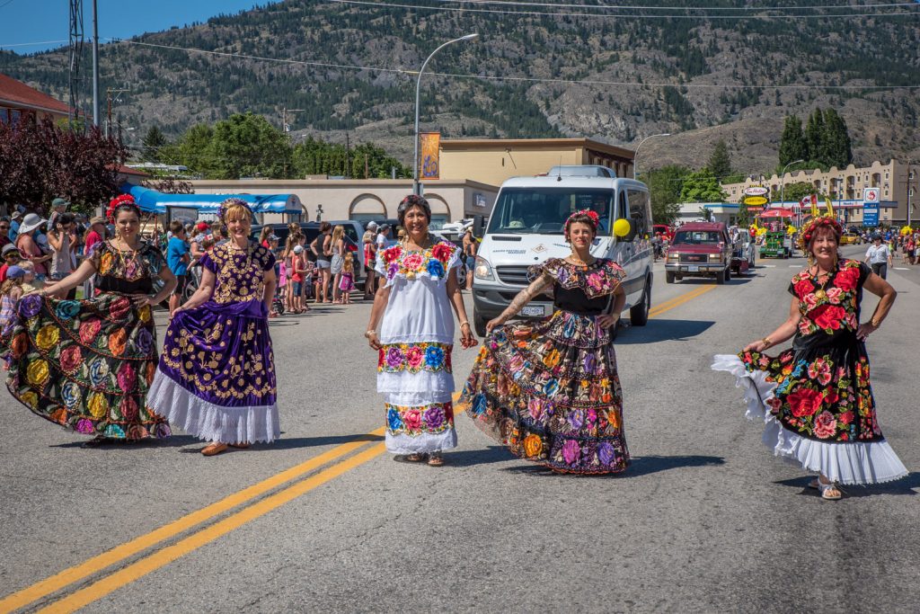 Women dressed in traditional ethnic costumes participated in the Cherry Fiesta parade. Their participation was organized by Sonia Lopez, centre, who wore traditional Mexican clothing. (Richard McGuire photo)