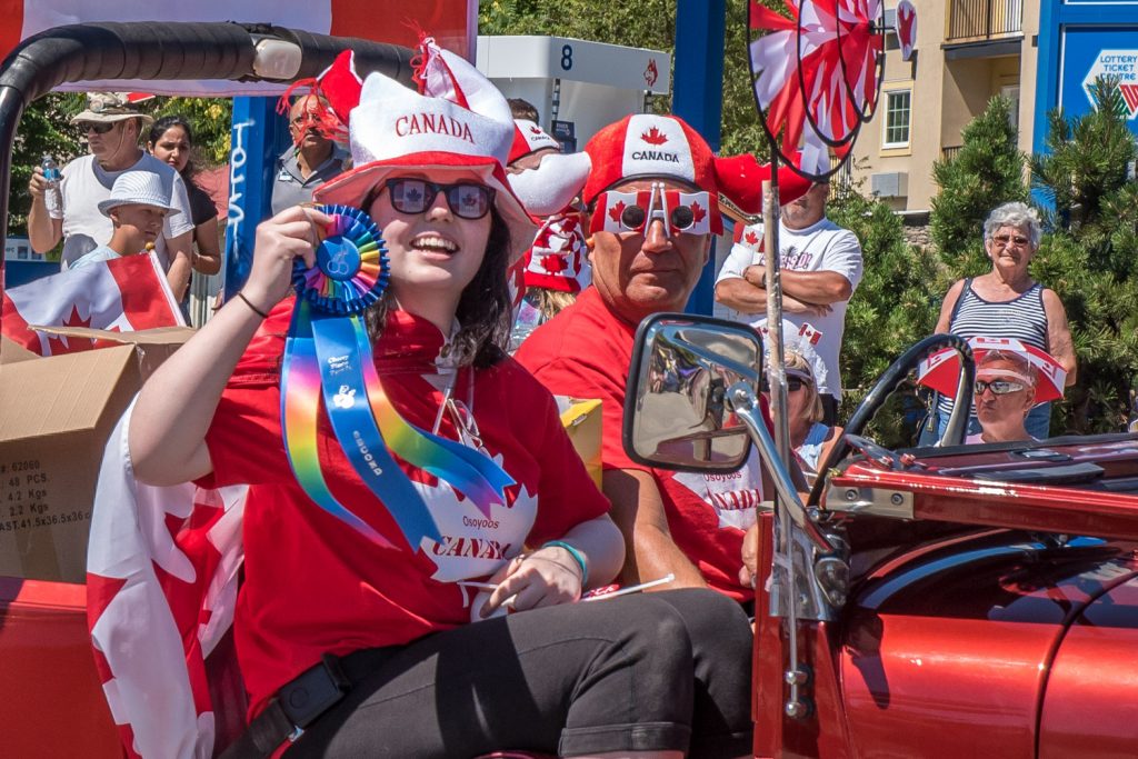 Participants on the AG Foods float show off the second place ribbon they won in the Cherry Fiesta parade. (Richard McGuire photo)