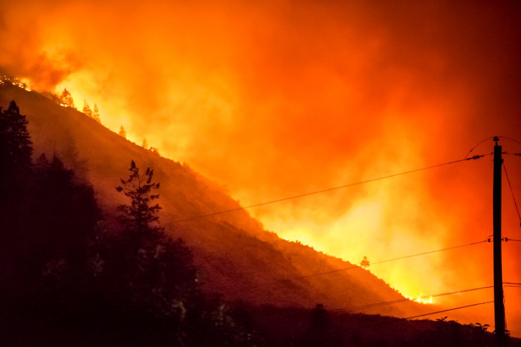 Massive flames leap up from the hills at the base of Mount Kobau as you approach the Testalinden fire along Highway 97 from the south, just north of Osoyoos. (Richard McGuire photo)