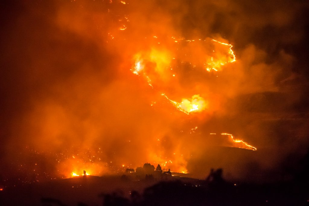 The side of Mount Kobau is lit up with flames in the Testalinden Creek area in this view from Black Sage Road taken at 10:10 p.m. Friday. (Richard McGuire photo)