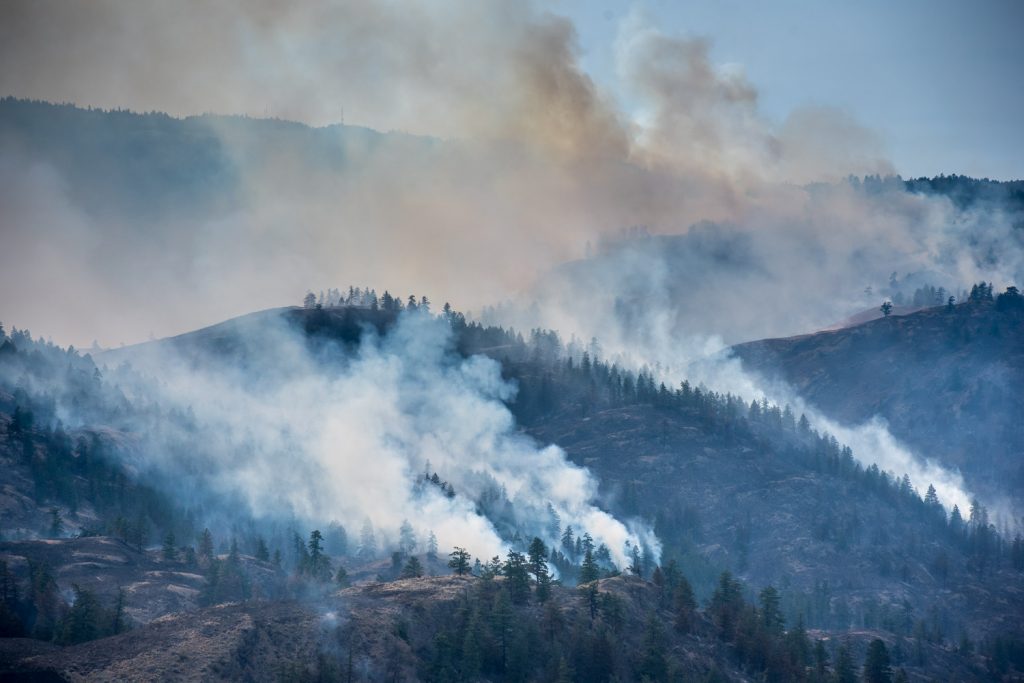 Smoke continued to blllow from areas on Mount Kobau below the Richter Pass Sunday evening as air attacks resumed. This photo was taken at 5:32 p.m. Sunday. (Richard McGuire photo)