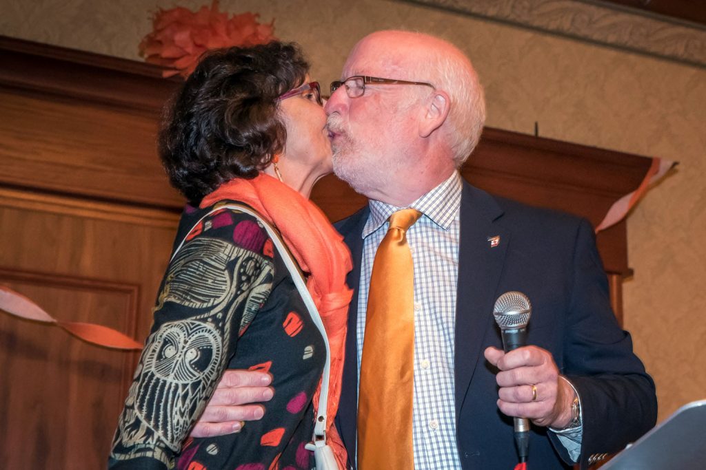 Richard Cannings, the new NDP MP for South Okanagan-West Kootenay, kisses his wife Margaret Holm as he thanks his family for supporting him through the long election campaign. (Richard McGuire photo)