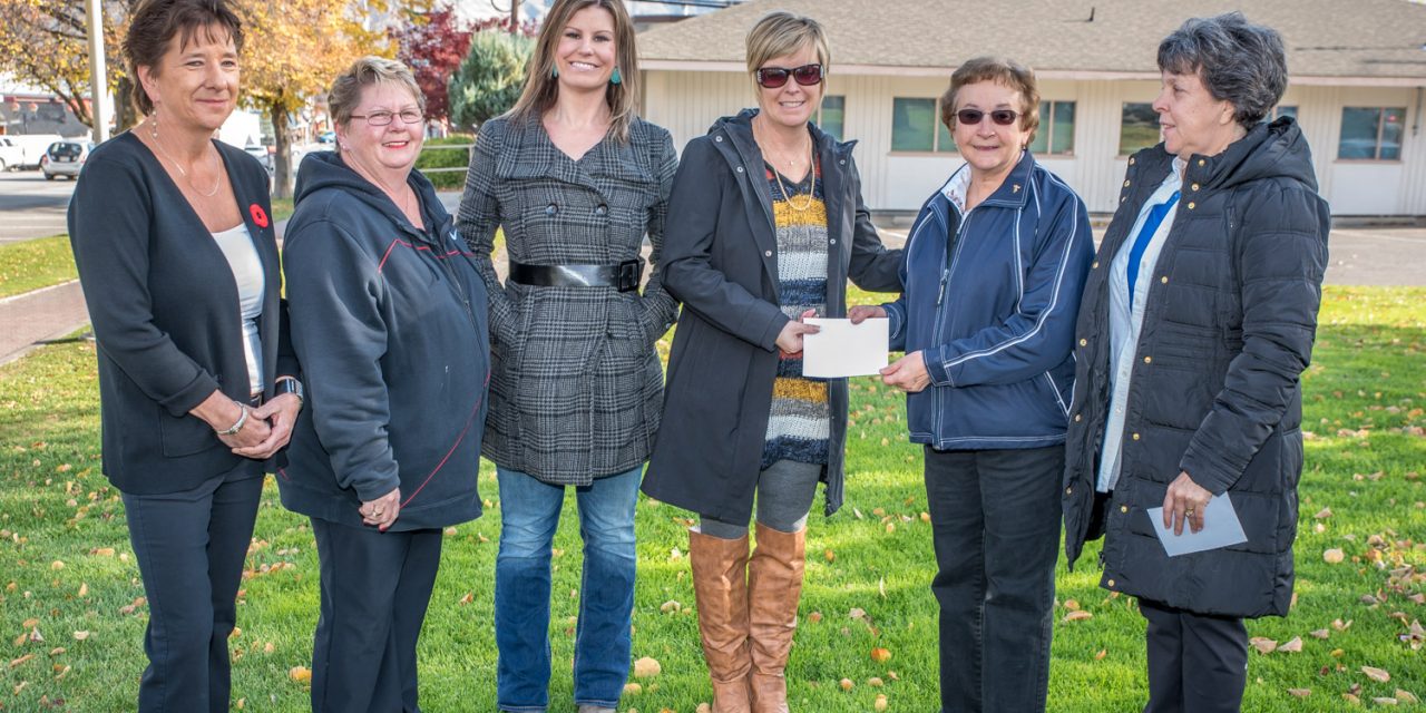 Community turns over $31,000 to help Rock Creek fire victims