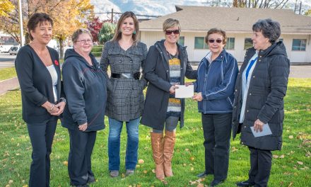 Community turns over $31,000 to help Rock Creek fire victims