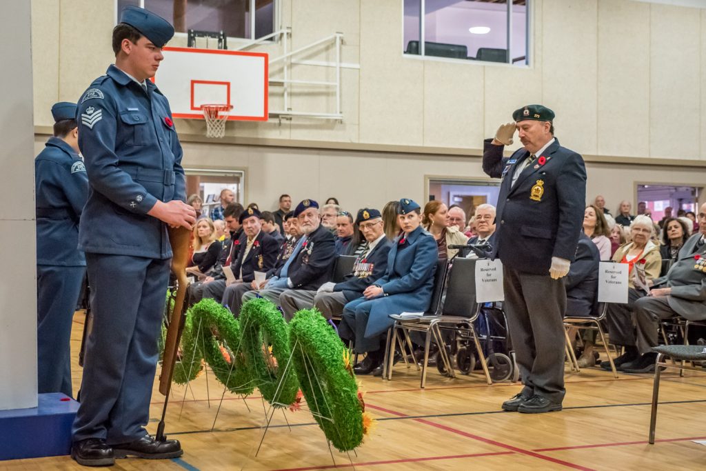 Bruce Davies, president of Branch 173 of the Royal Canadian Legion salutes after laying a wreath on behalf of the Legion. (Richard McGuire photo)