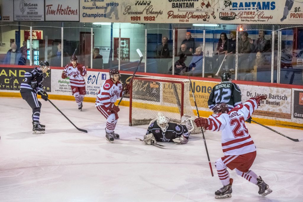 Colten Rhodes (right) celebrates after scoring his second goal Wednesday, which was also the Coyotes' second in a 4-3 victory over the North Okanagan Knights. The Coyotes went on to win games on Friday and Saturday in Armstrong, sweeping the series in just four games. (Richard McGuire photo)