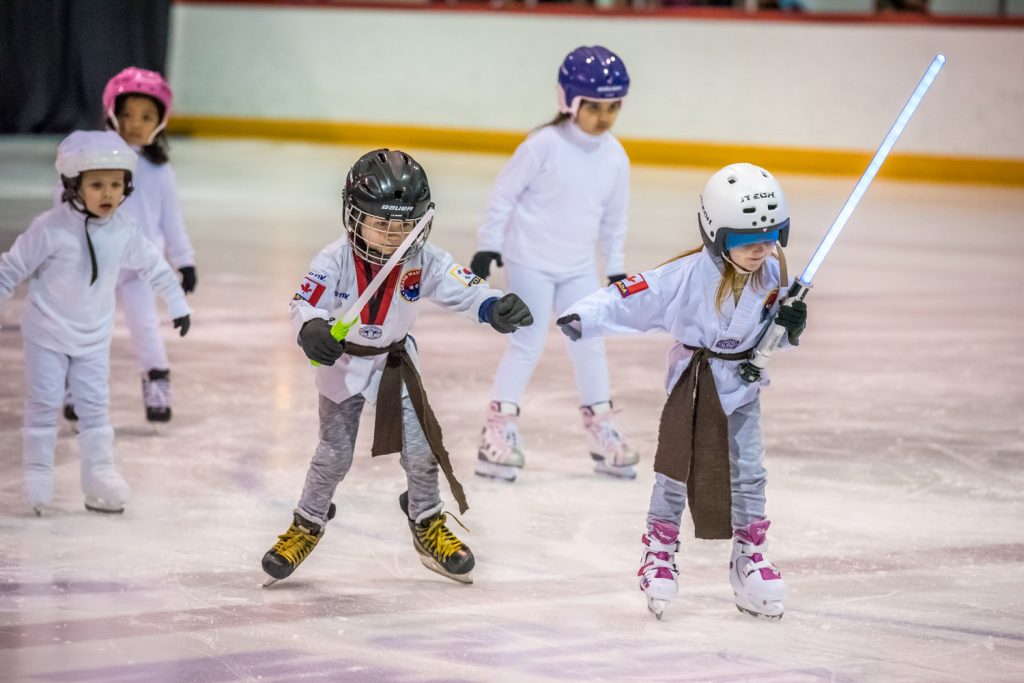 Children from the CanSkate 2 program, some armed with light sabres, did a Star Wars number. (Richard McGuire photo)