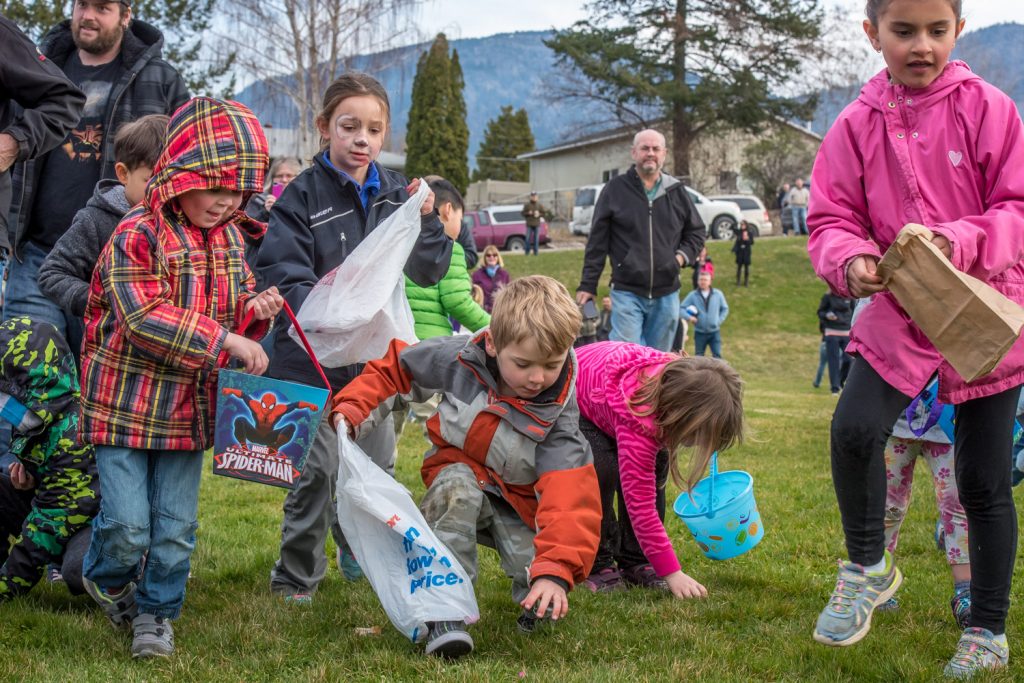 Not even a full minute elapsed when the last of thousands of candy Easter eggs were picked from the lower playground at Osoyoos Elementary School. (Richard McGuire photo)
