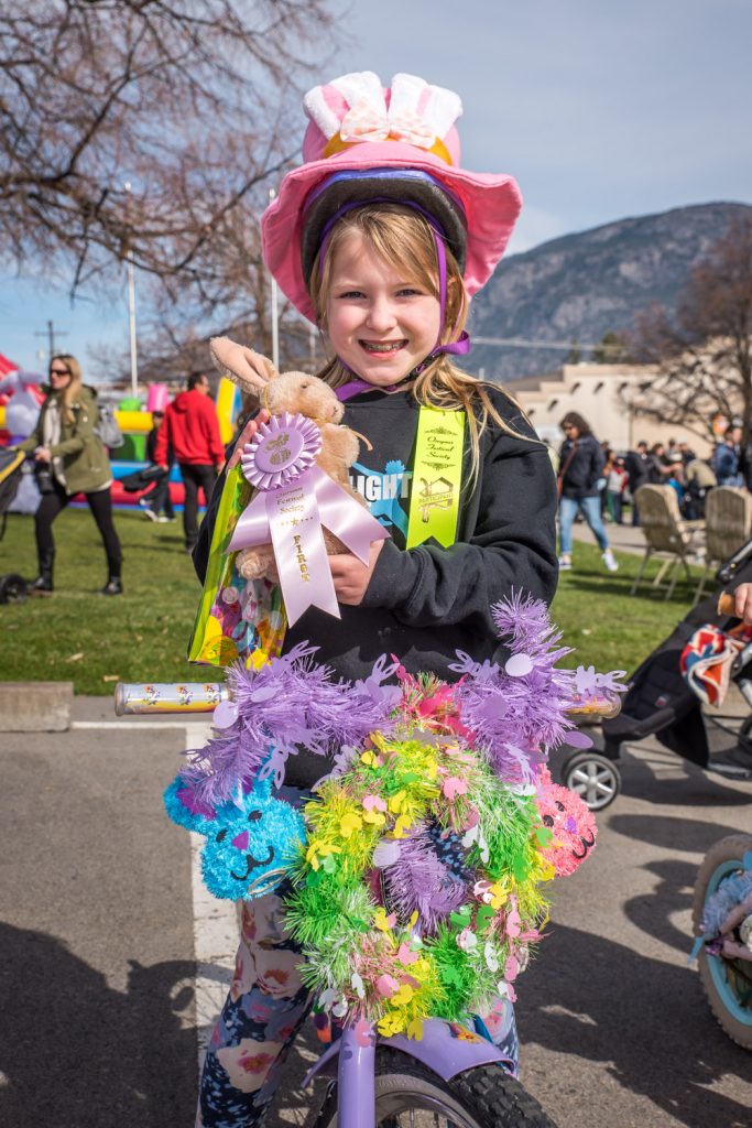 Madison Mather, 8, visiting from Vancouver, took one of the first-place ribbons for her beautifully decorated bike in the Kiwanis Bike and Trike Judging. (Richard McGuire photo)