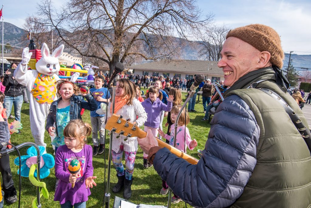 Singer Mat Duffus had the children, and an Easter Bunny, up dancing to his music at Town Square. (Richard McGuire photo)
